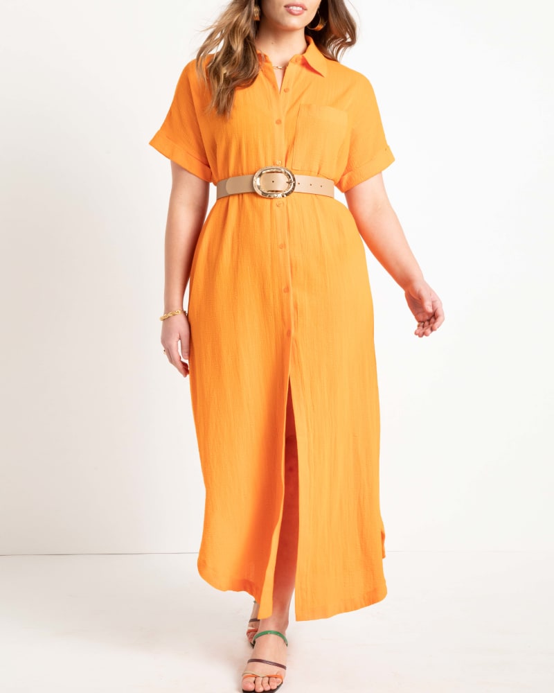 Front of a model wearing a size 28 Maxi Shirtdress Coverup in Persimmon Orange by ELOQUII. | dia_product_style_image_id:272897